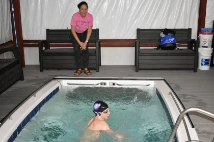 A young swimmer practicing at SwimTec